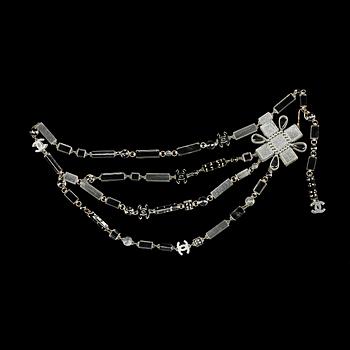 1211. A plexiglass necklace/belt by Chanel, fall 2004.