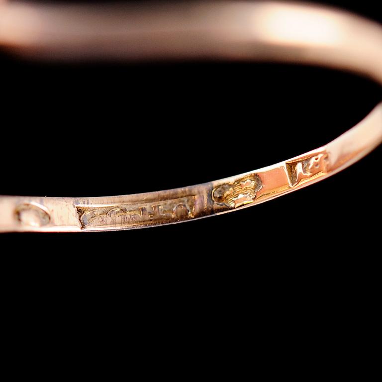 RING, 18 k guld, s k syskonring med briljant 0.45 ct samt smaragd, CG Hallberg.