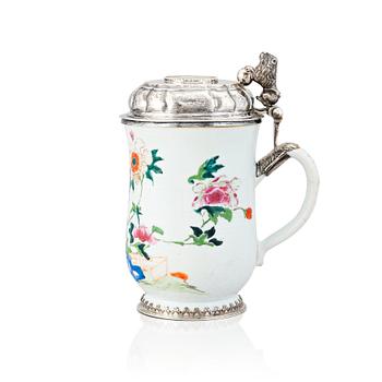 185. An 18th century famille rose and silver tankard, lid with mark of Nils Gram, Copenhagen 1756.