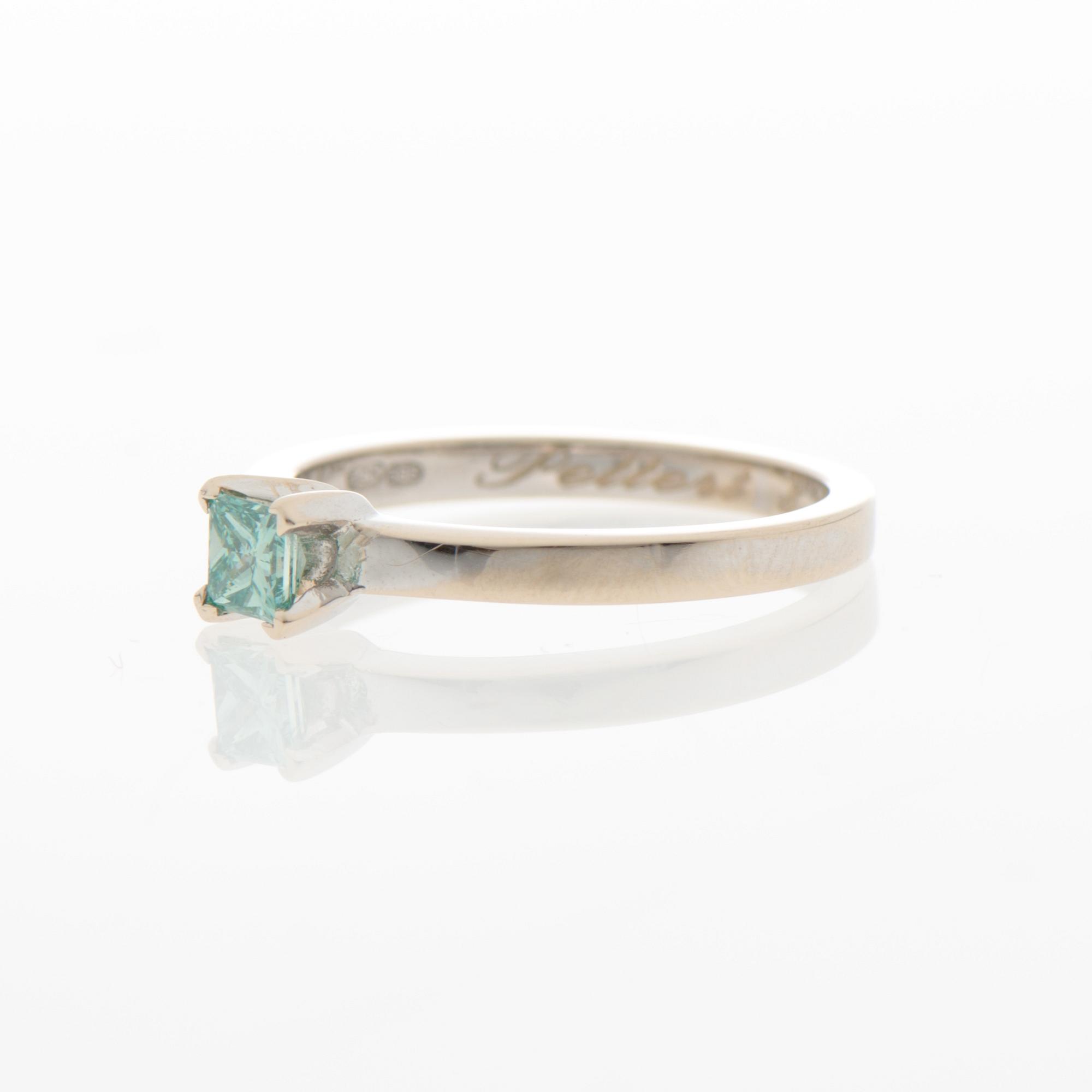 A RING, treated green diamond, 14K white gold.
