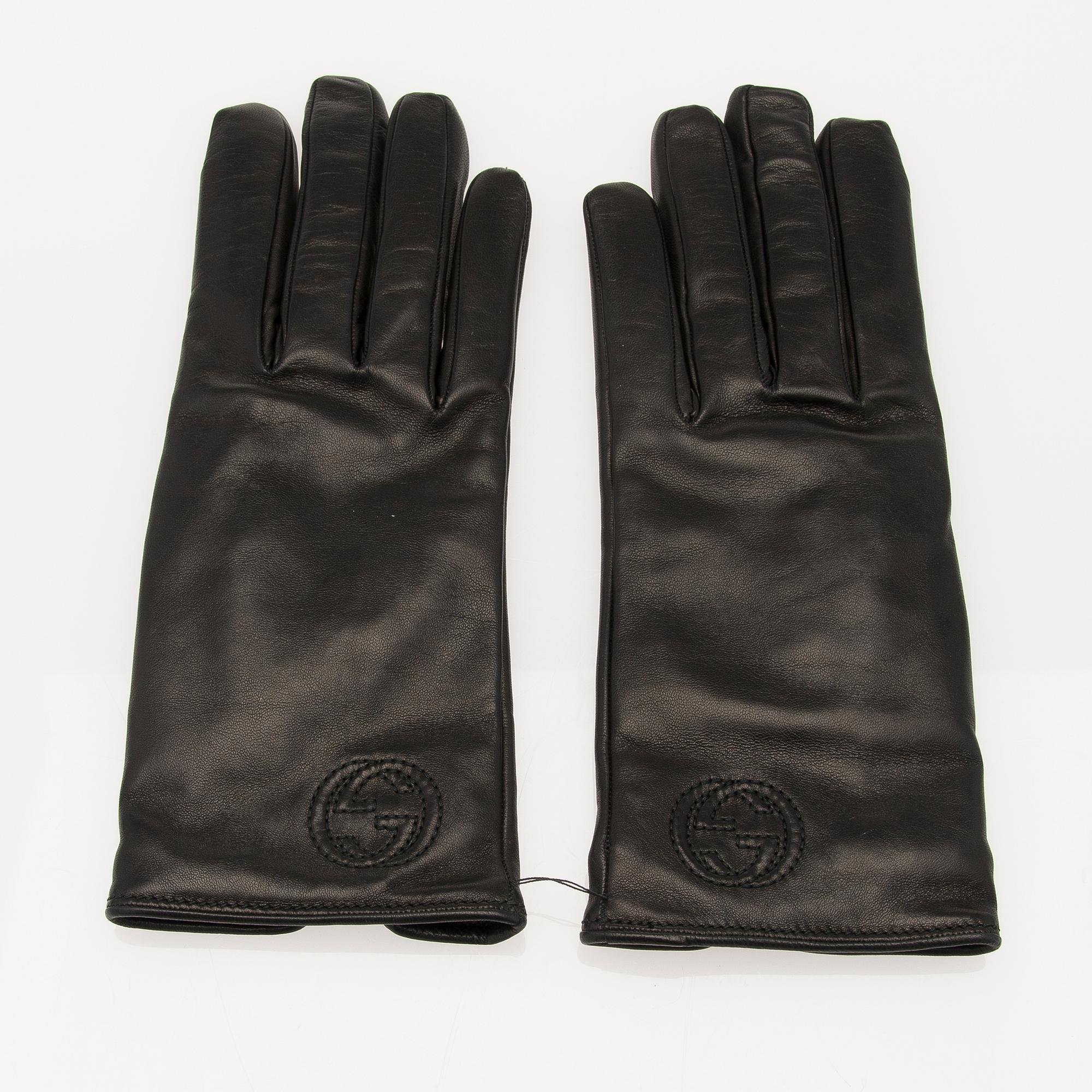 A pair of Gucci ladies' leather gloves.