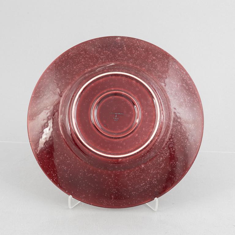Wilhelm Kåge, a model 909 red "Argenta" dish, Gustavsberg, Sweden, 1943.