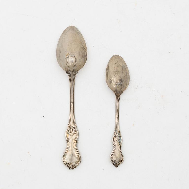 Skedar, 23 st, silver, "Olga", CG Hallberg, Stockholm 1910.