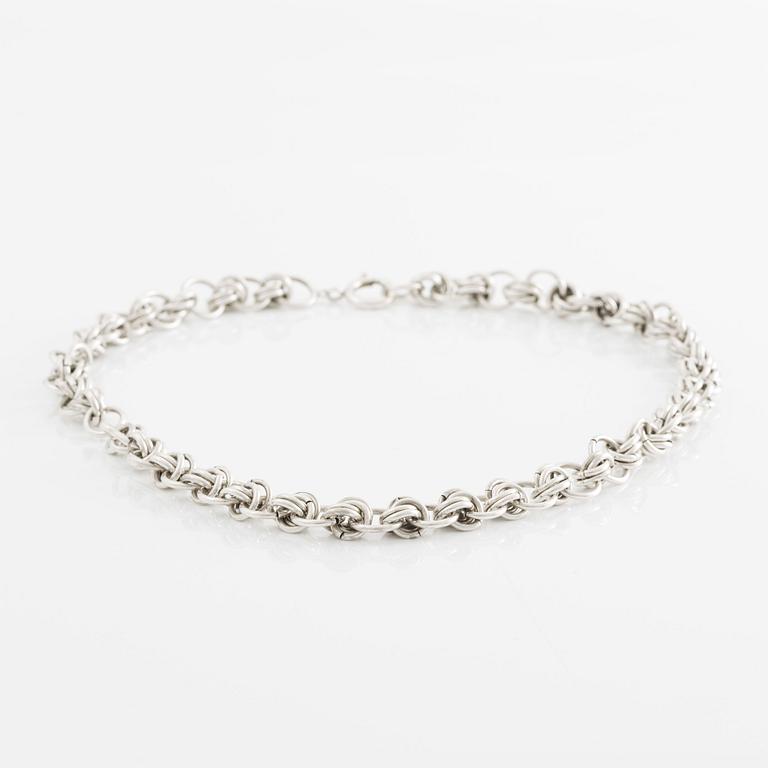 Silver necklace.