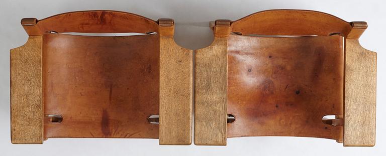 Børge Mogensen, a pair of oak and natural leather "Spanish Chair", model 226, Fredericia Stolefabrik, Denmark.