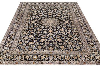 A Kashan carpet, c. 410 x 270 cm.