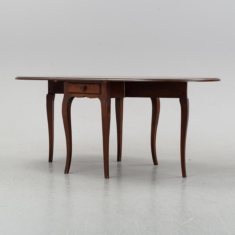 A stained pine gate-leg table, Åmells möbler.