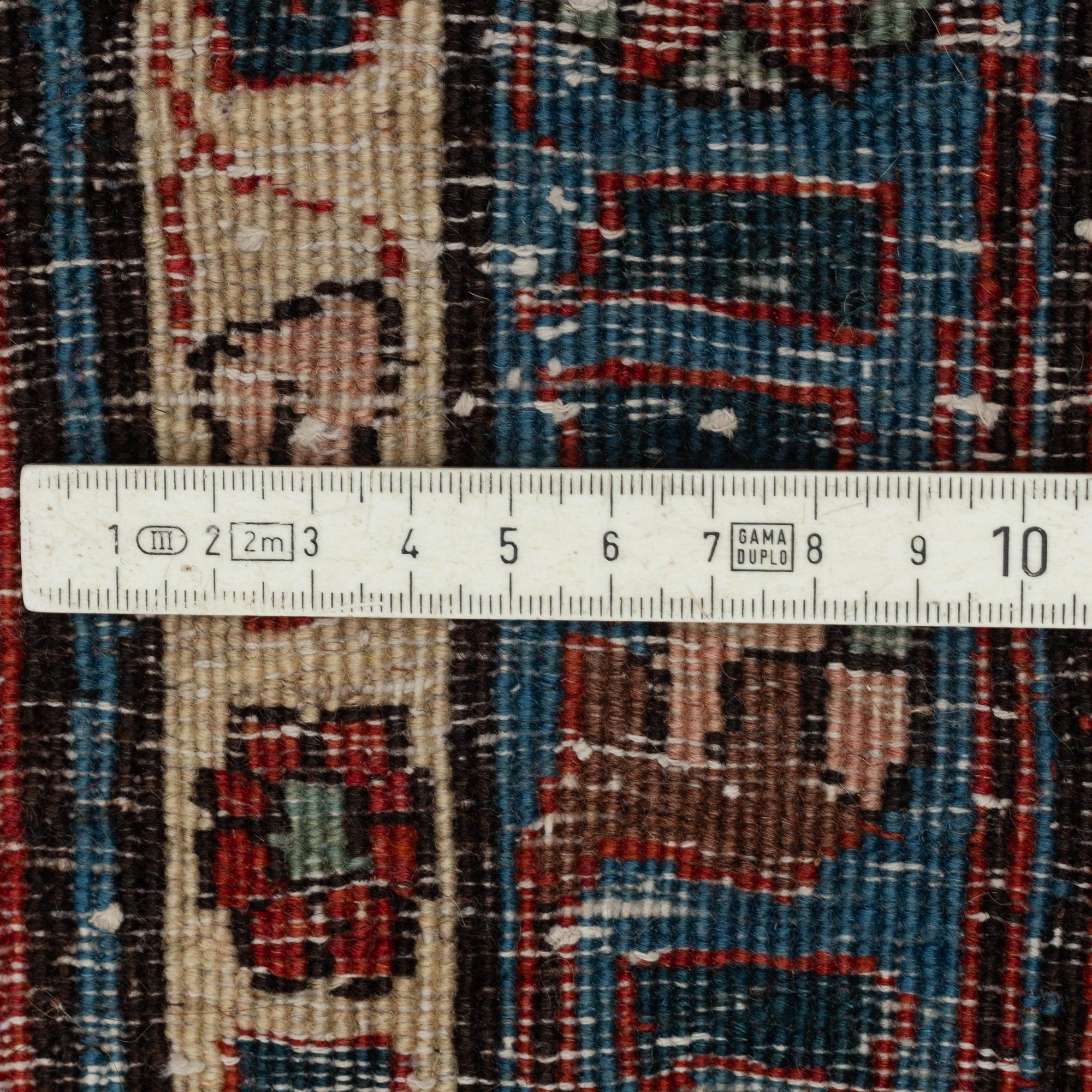 A semi-antique Veramin 337 x 224 cm.