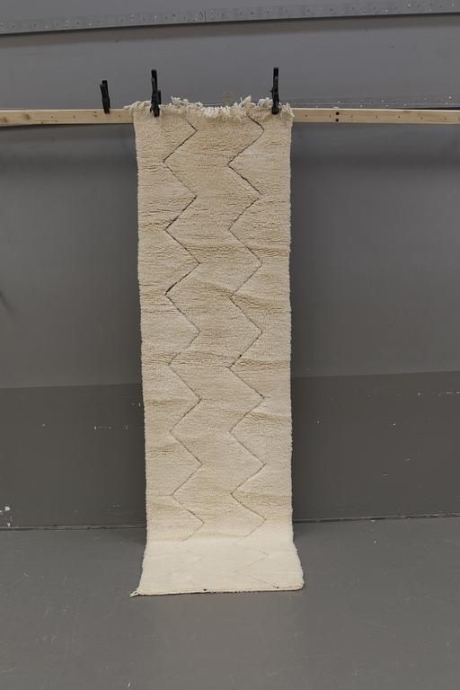 A Moroccan runner carpet, 290 x 70 cm.