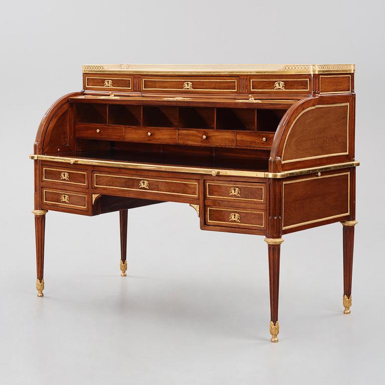 A Louis XVI-style mahogany and ormolu mounted 'bureau a cylindre', later part of the 19th century.