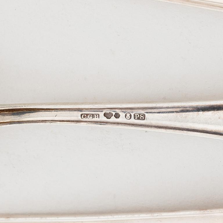 A 37-piece model 'Slottsbarock' silver cutlery, including CG Hallberg, Stockholm, 1956.