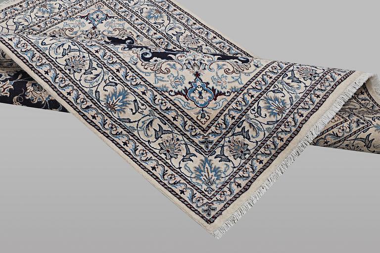 A rug, Nain, part silk, ca 198 x 144 cm.