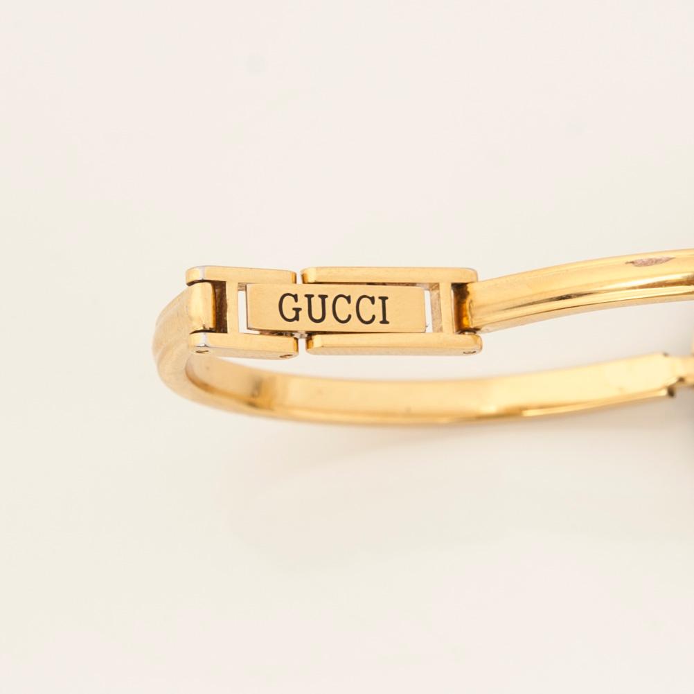 ARMBANDSUR, Gucci.