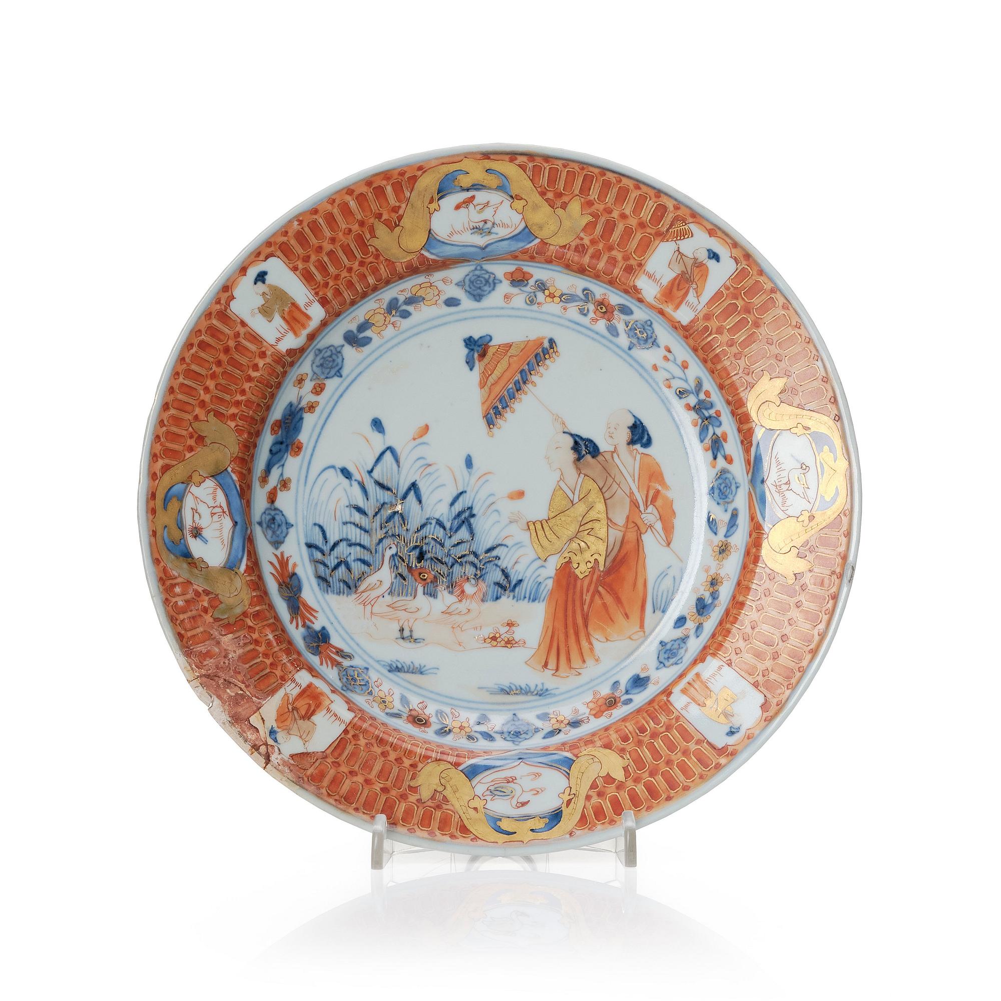 Chinese Imari ’Dame au Parasol’ plate decorated in underglaze blue, iron-red and gilt, Qing dynasty, Qianlong 1730-40.