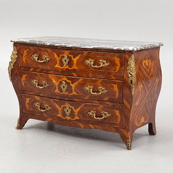 A French Louis XV marquetry and gilt-bronze mounted commode 'Aux bustes de femmes", later part of the 18th century.