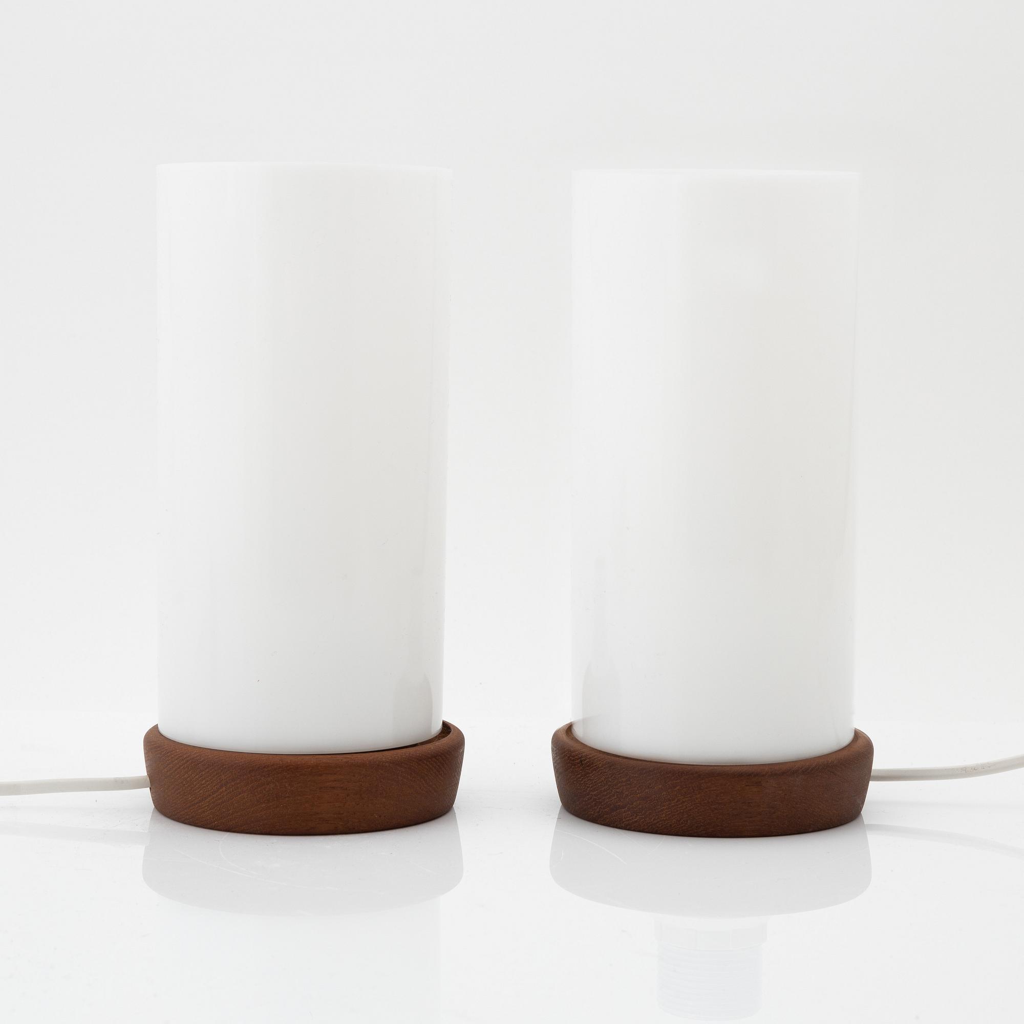 Uno & Östen Kristiansson, a pair of teak and acrylic table lights, Luxus, Vittsjö.