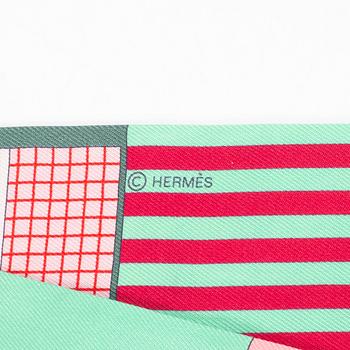 Hermès, a 'Twilly' scarf.