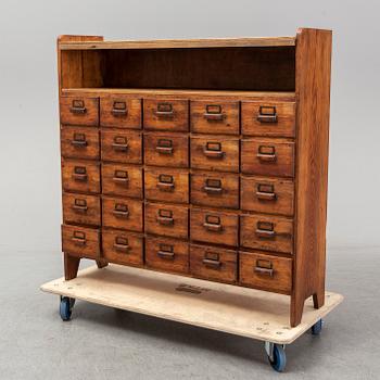 A circa 1900 chest of 20 drawers.