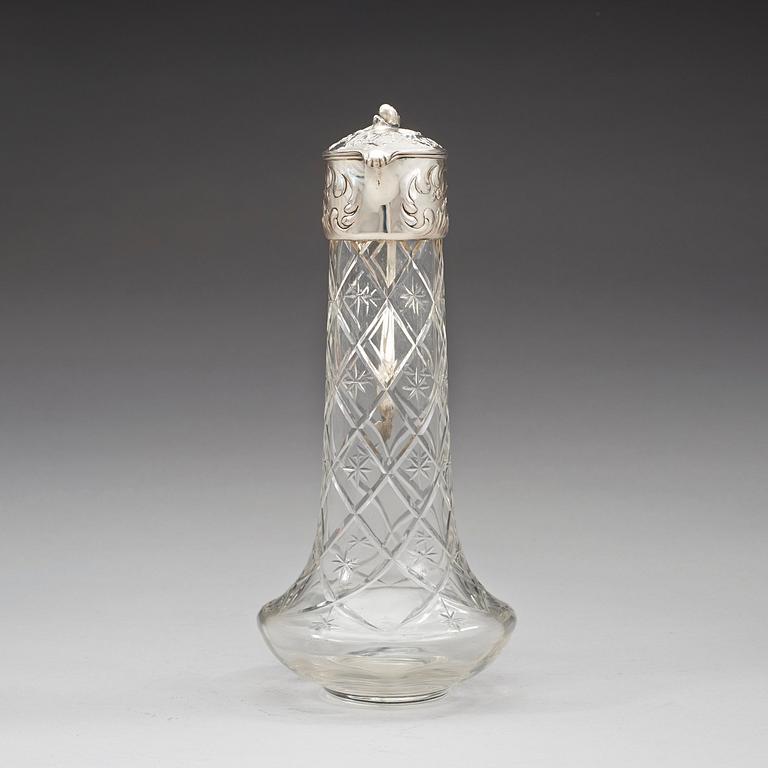 A Swedish 20th century parcel-gilt and cut glass decanter, marks of W.A. Bolin, Stockholm possibly 1918.