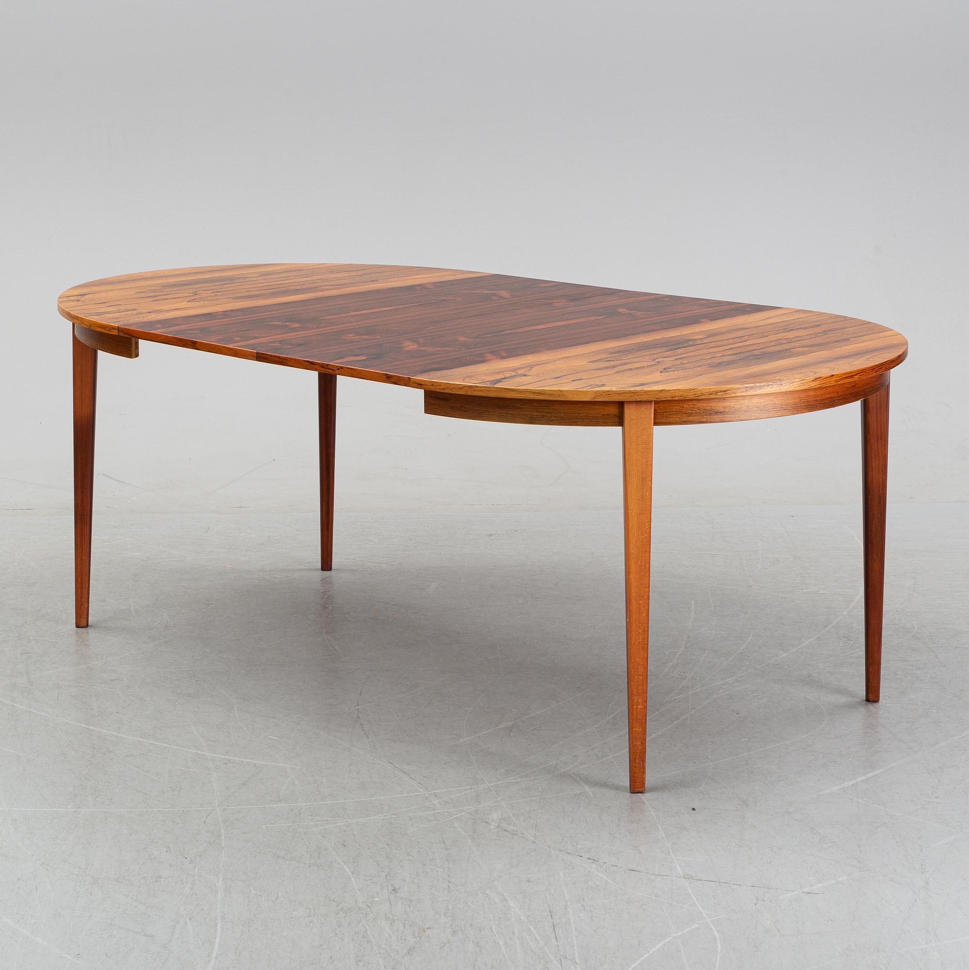 A rosewood dining table, 1970's.