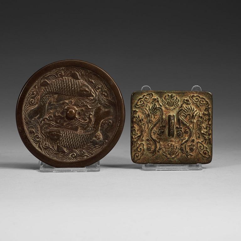 A bronze mirror, and plaque, partly Jin dynasty (1115-1234).
