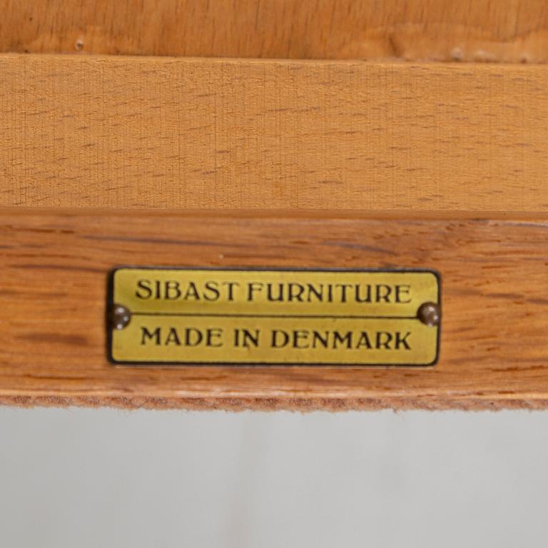 Helge Sibast, A set of four oak and teak chairs, Sibast Furniture, Denmark, mid 20th Century.