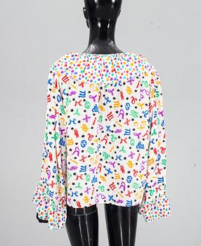 BLUS, Yves Saint Laurent.