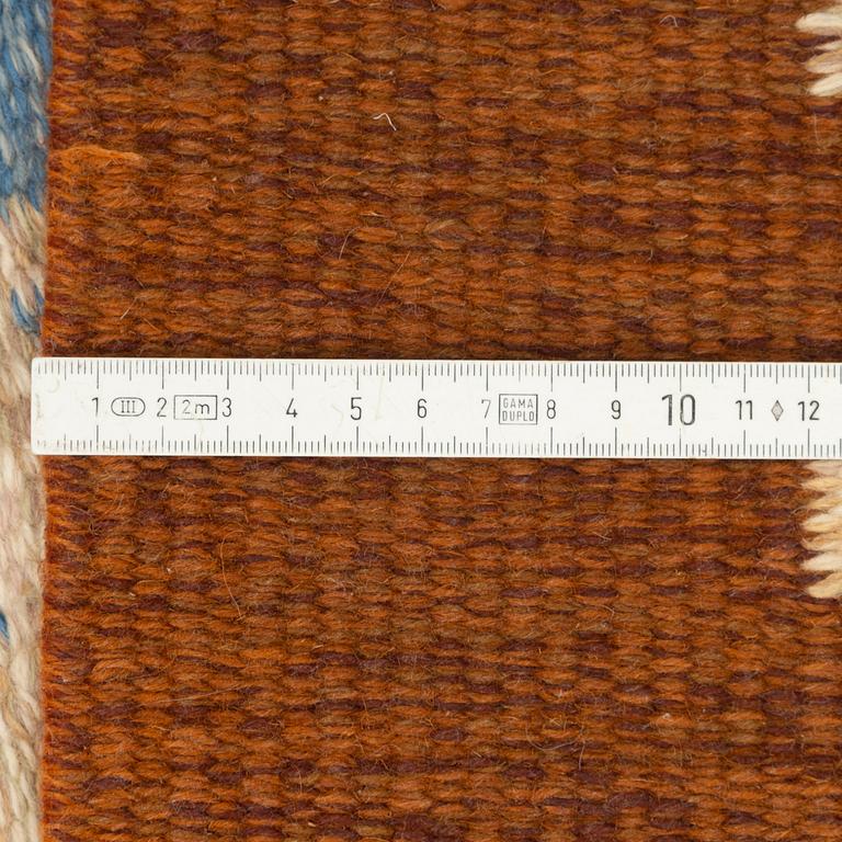 Alice Wallebäck, a flat weave rug, signed AW, c. 235 x 170 cm.