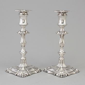 A pair of English silver candlesticks by Henry Wilkinson, London 1895.