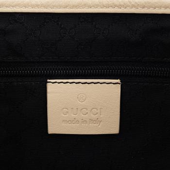 Gucci, a 'Jackie' leather handbag.