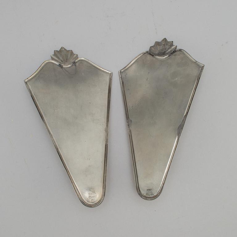 A pair of Swedish pewter Art deco wall scones from Ystad Metall, 1931.