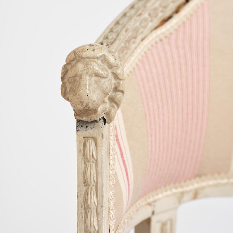 A pair of late Gustavian open.back armchairs, Stockholm, late 18th century.