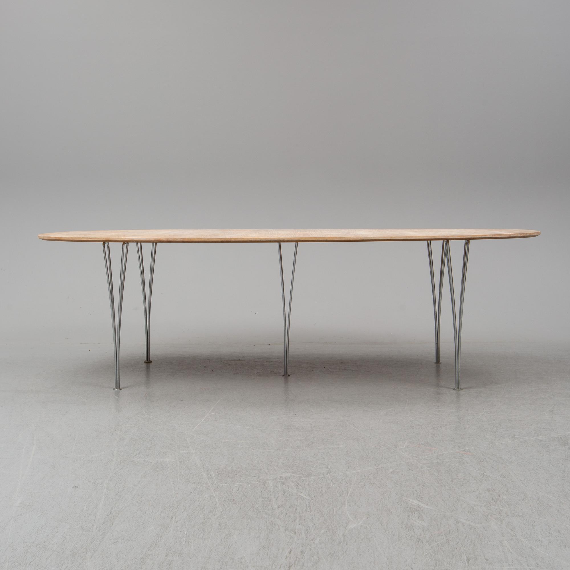 BRUNO MATHSSON & PIET HEIN, a 'Superellips' dining table, Fritz Hansen, Denmark, 1994.