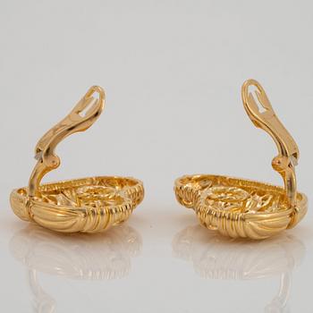 A pair of 18K gold Tiffany earrings.