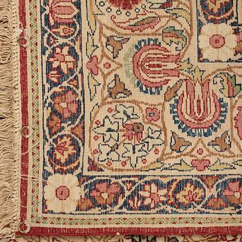 A RUG, an antique/semi-antique Kerman Laver  figural, ca 232,5 x 139,5 cm.