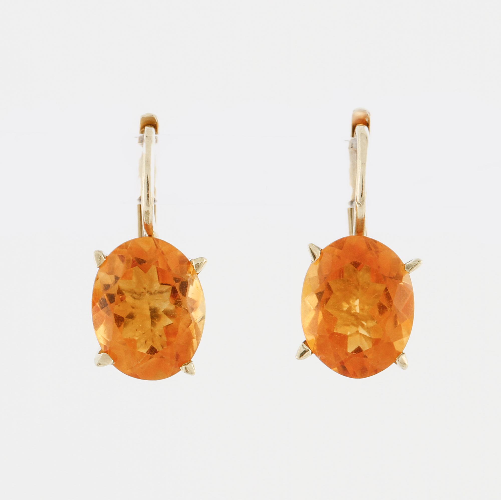 A pair of citrine earrings.