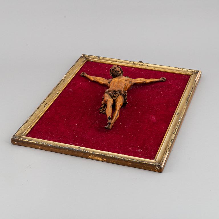 A carved wood crucifix, 17th/18th century.