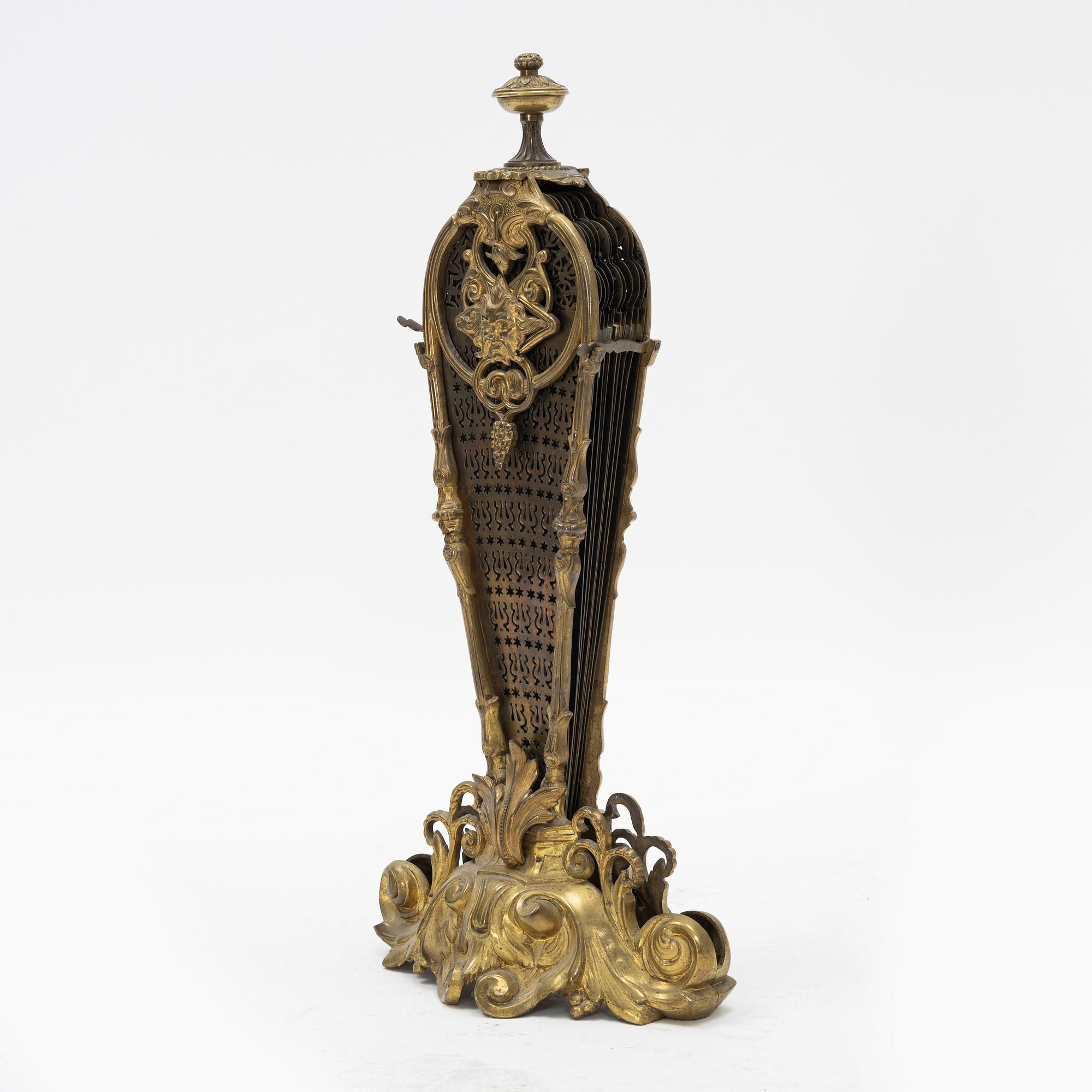 A brass fire grid, early 20th century.