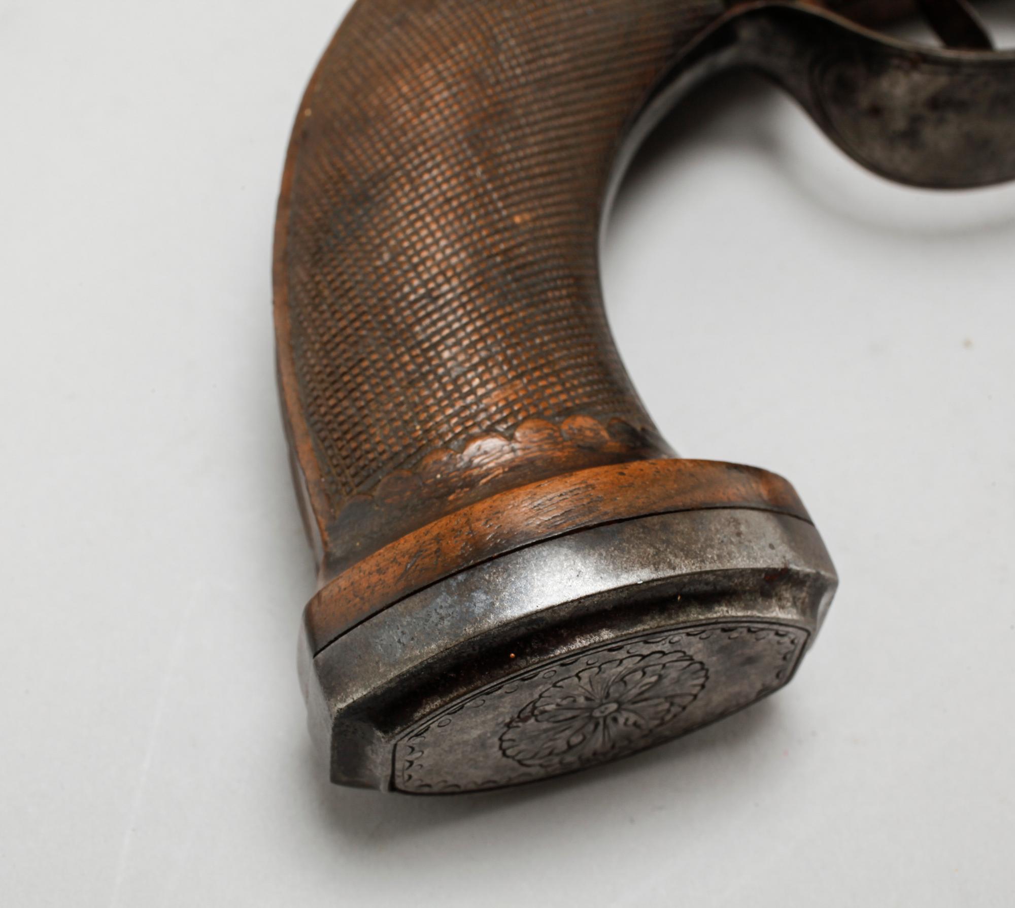 A pair of percussion guns, around the mid 19th century.