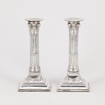 LJUSSTAKAR, ett par, nysilver, 1800-tal.