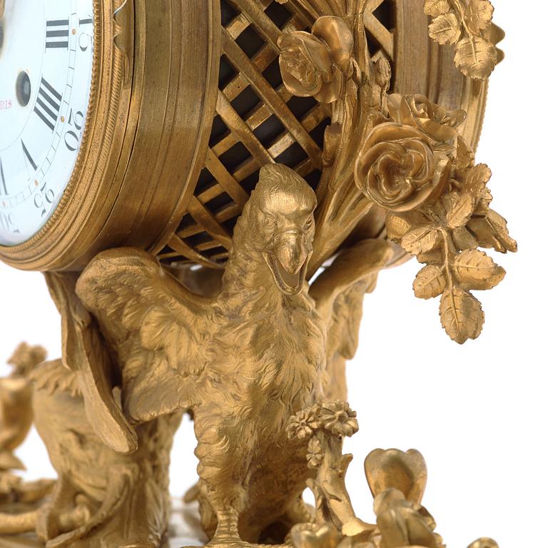 A Louis XVI-style late 19th century mantel clock by Eugene Hazart (1838-1891, bronze maker in Paris).