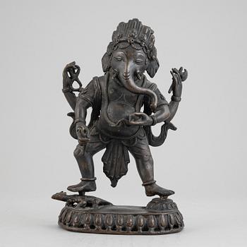 An Indian bronze figure of Ganesha, presumably 19th century.