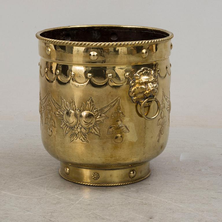 An 18th century brass flower pot.