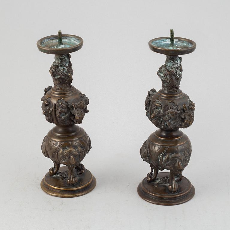 A pair of Japanese censers/candle stick holders, circa 1900.