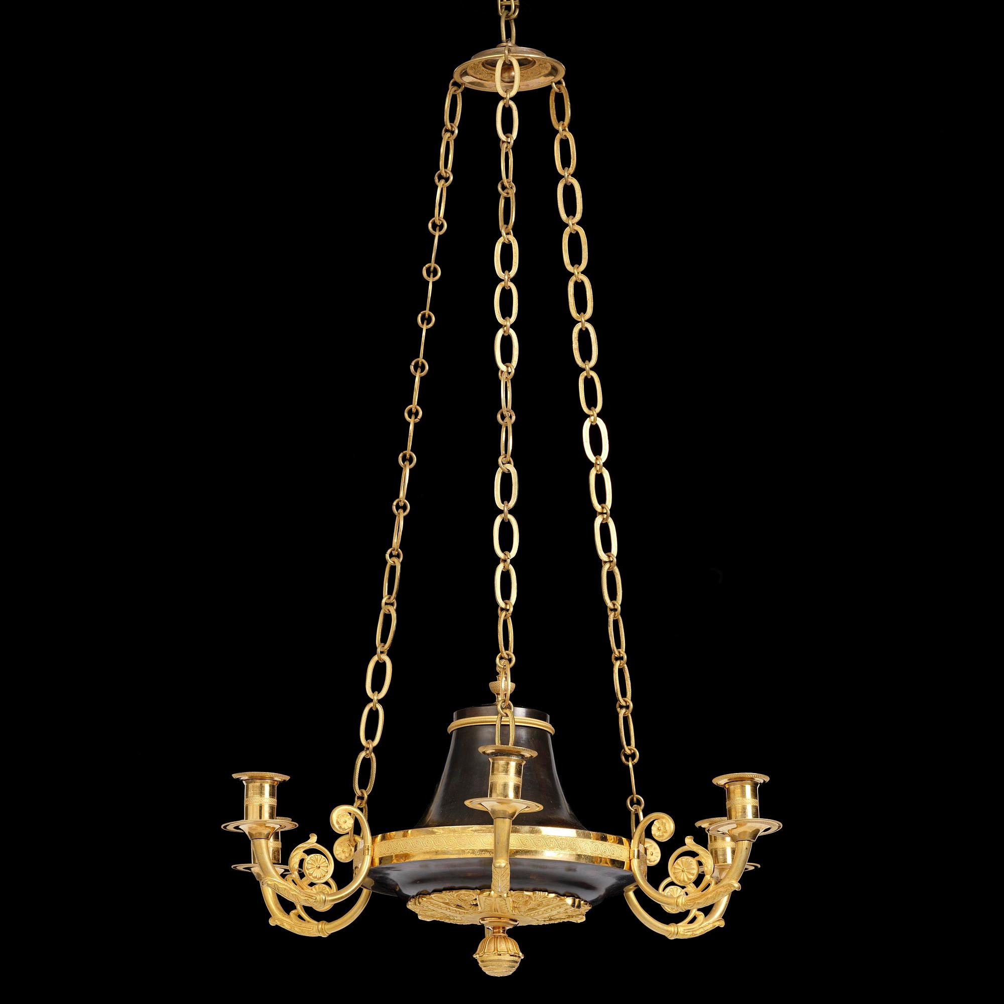 A Swedish Empire ormolu and patinated six-branch chandelier, Stockholm, early 19th century.