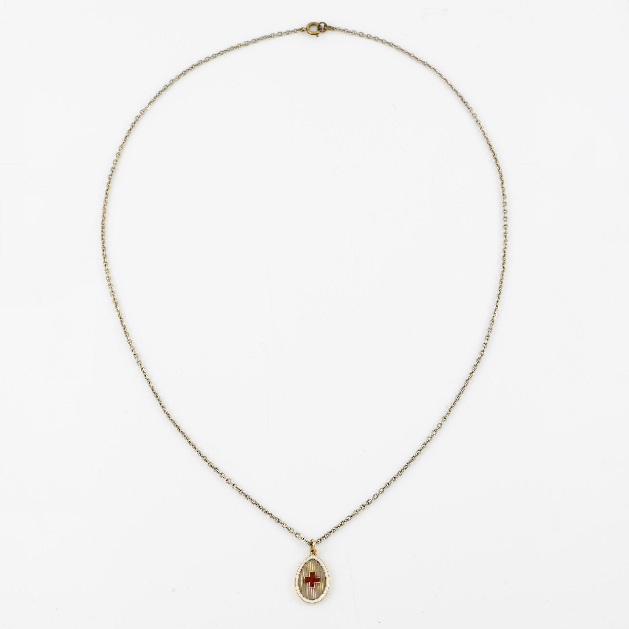 An enamel gold Red cross pendant by Fabergé.