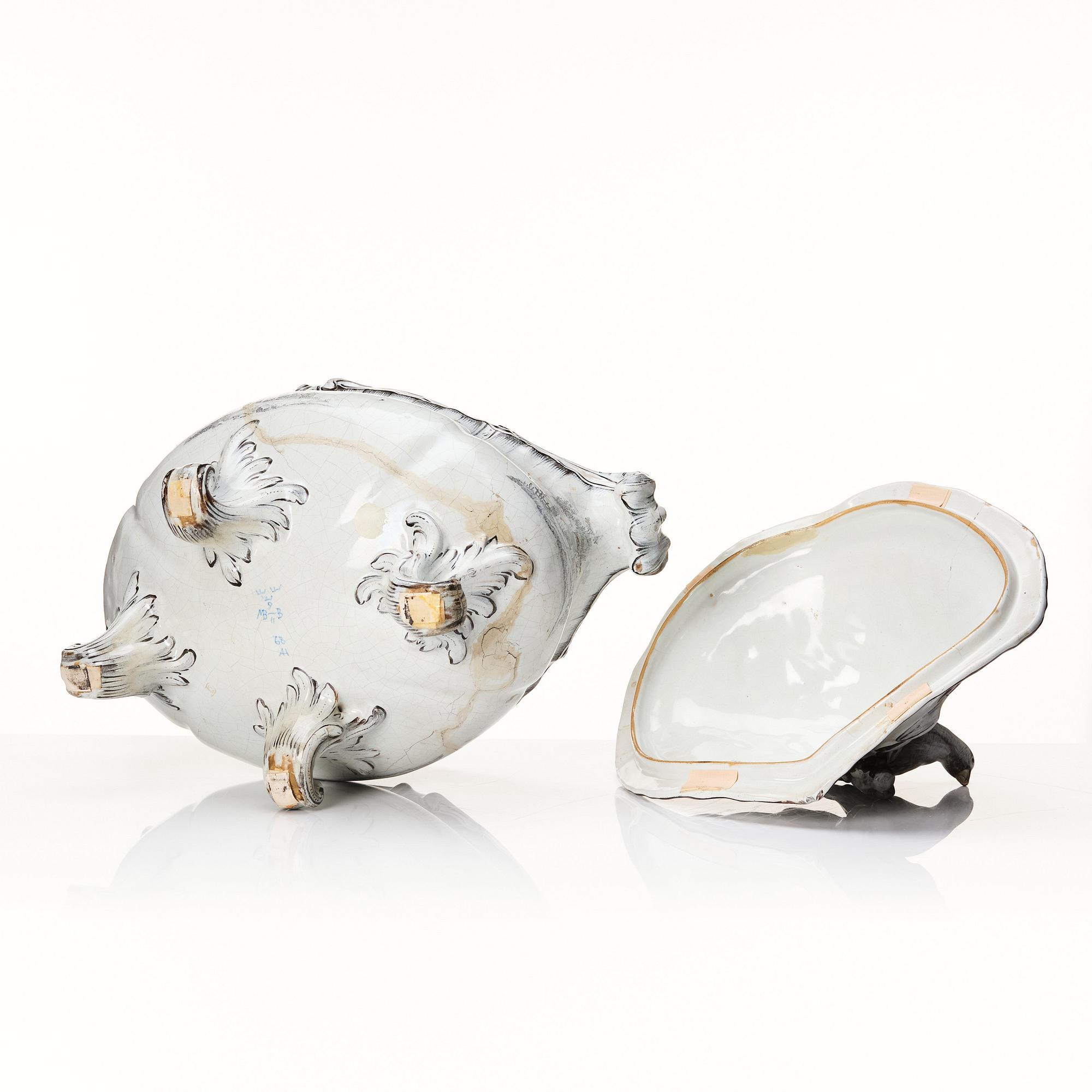 A Swedish Marieberg faience tureen with cover, dated 1768.