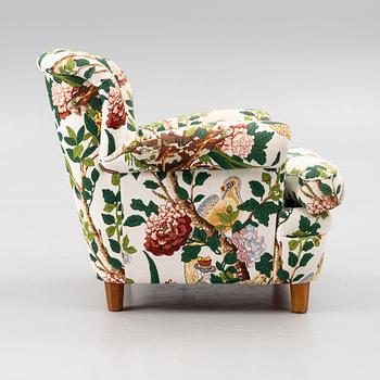 Josef Frank, a model 568 armchair, Firma Svenskt Tenn Sweden, after 1985.
