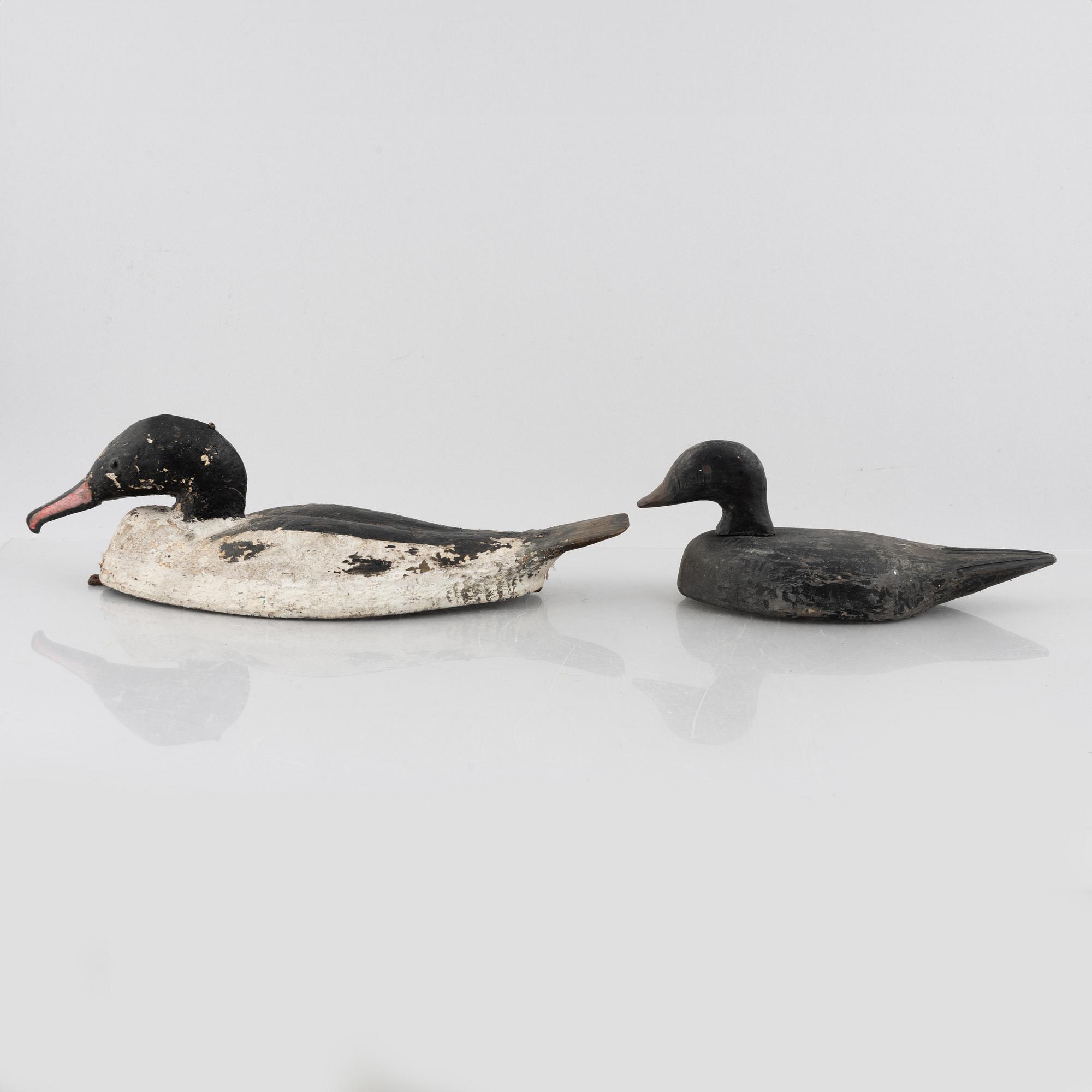 A set of six wooden duck decoys, 20th century.