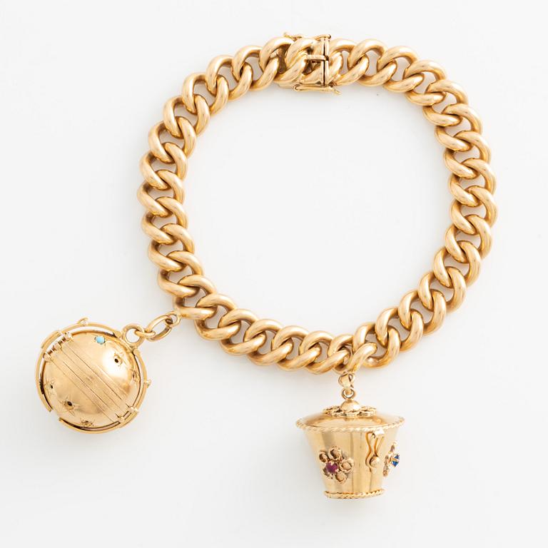 Bracelet, 18K gold with two large charms.